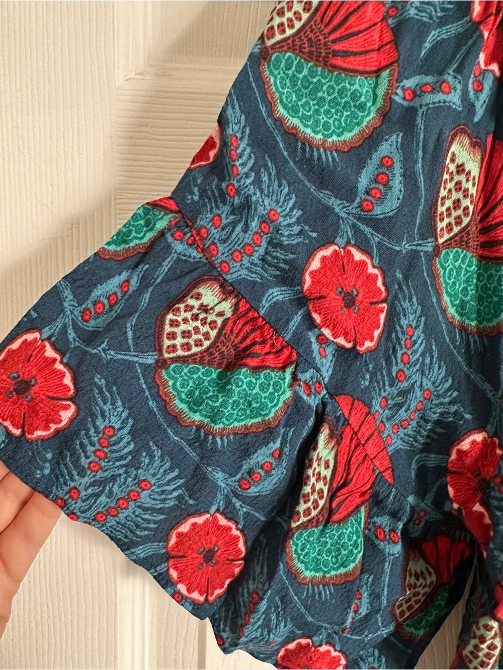 Maeve Teal Floral Ruffle V-Neck Blouse with Red Accents - Picture 3 of 8